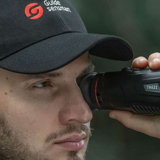 Hunter Using Guide Thermal Monocular