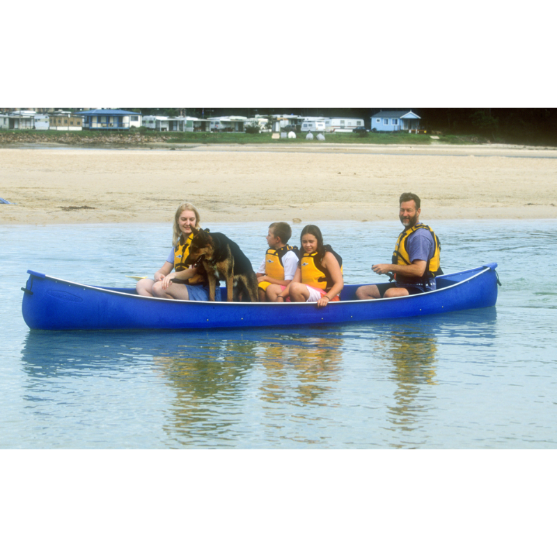 Australis Canoes Swagman Canoe 4 people and a dog paddling on the coast