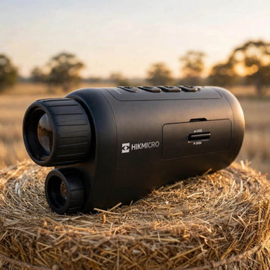 HIKMICRO Heimdal H4D Night Vision Monocular on top of a Hay Bale