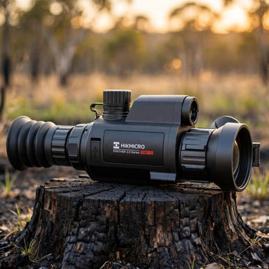 HIKMICRO Panther 2.0 PQ50L Thermal Scope on top of a Burnt Stump