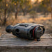 HIKMICRO Raptor RH50L Multi Spectrum Binoculars on top of a crate lid