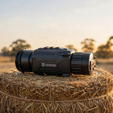 HIKMICRO Thunder TH35PCR 2.0 Thermal Clip-On on top of a Hay Bale