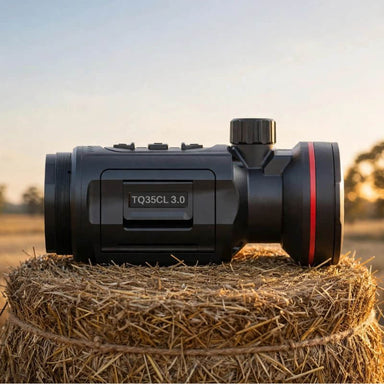 HIKMICRO Thunder TQ35CL 3.0 Thermal Clip-On on top of a Hay Bale