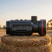 HIKMICRO Thunder TQ35CL 3.0 Thermal Clip-On on top of a Hay Bale