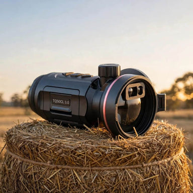 HIKMICRO Thunder TQ50CL 3.0 Thermal Clip On on top of a Hay Bale