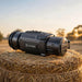 HIKMICRO Thunder TQ50CR 2.0 Thermal Clip-On on top of a Hay Bale