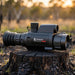 Hikmicro Panther 2.0 PQ35L Thermal Scope on top of the burnt stump