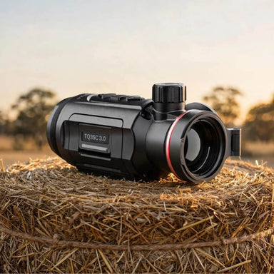 Hikmicro Thunder TQ35C 3.0 Thermal Clip On on top of a Hay Bale