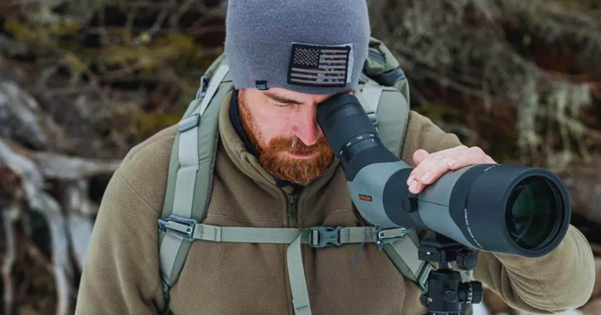 Hunter glassing through Athlon Spotting Scope