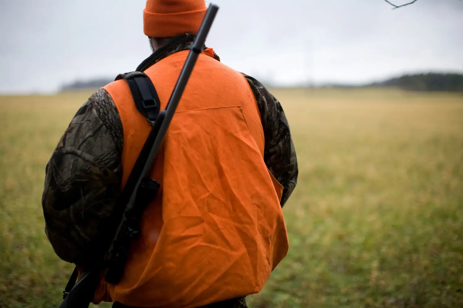 Hunter wearing hi vis vest